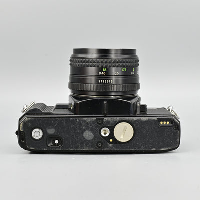 Minolta X700  + MD 50mm F1.7 Lens + MD 135mm F3.5 Lens