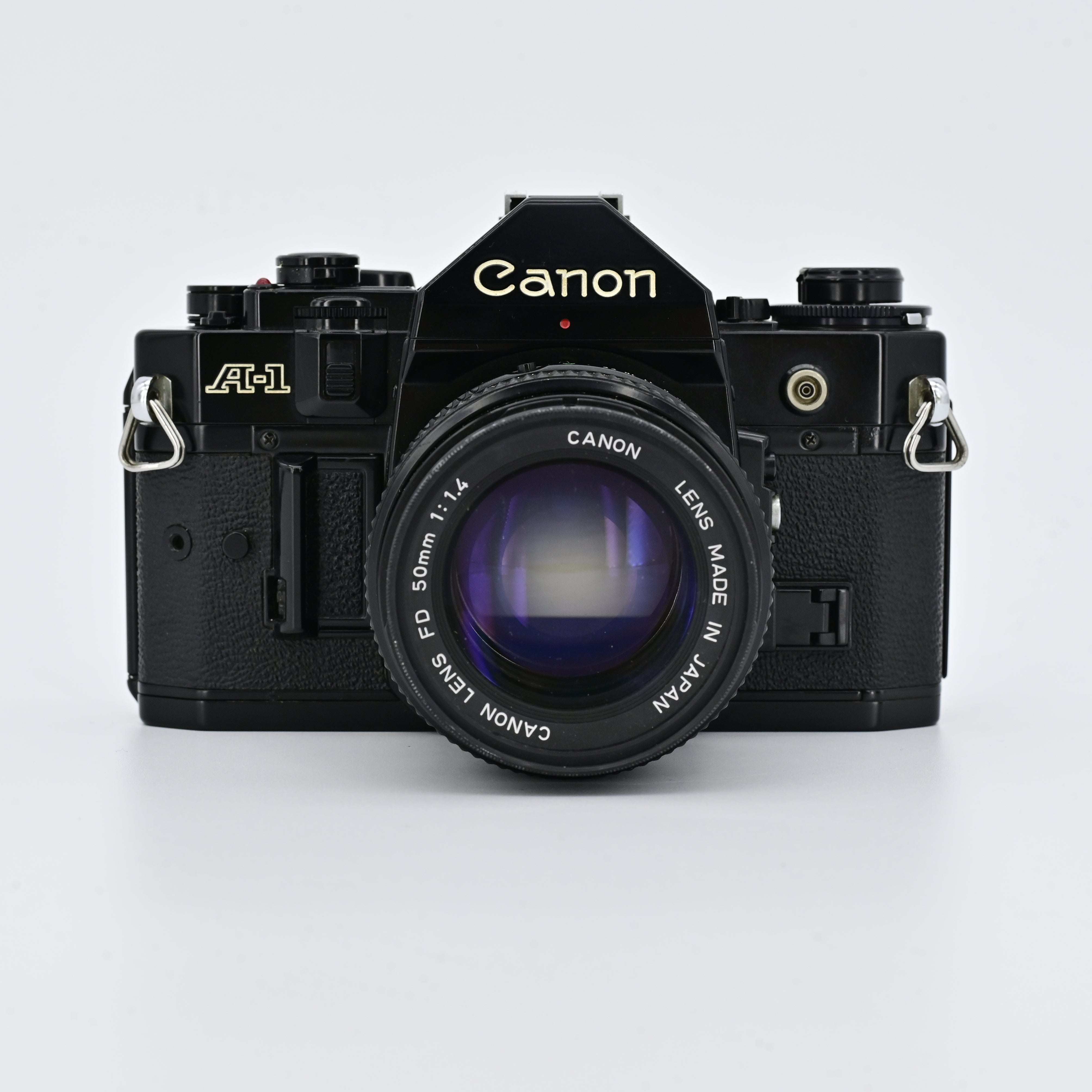 Canon A1 Black + FD 50mm F1.4 Lens – SHOWA